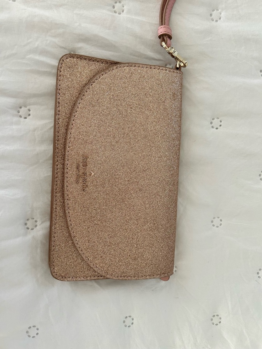 kate spade glitter wristlet in rose gold